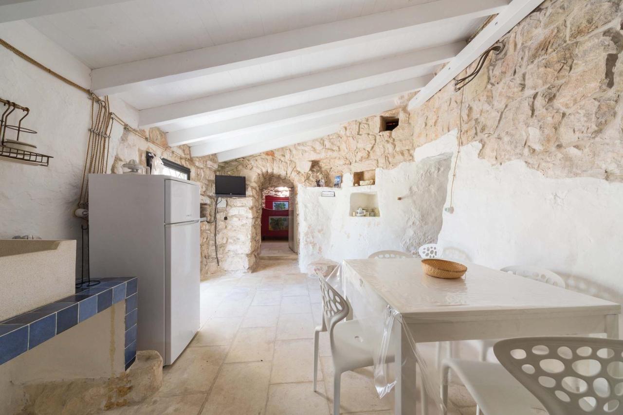 Вилла Trulli Le Scalelle Морчано-ди-Леука Номер фото